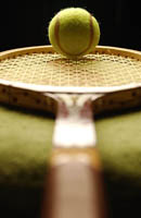 Tennis Ball on Racquet Tennis Ball on Racquet